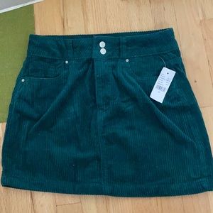Green mini skirt